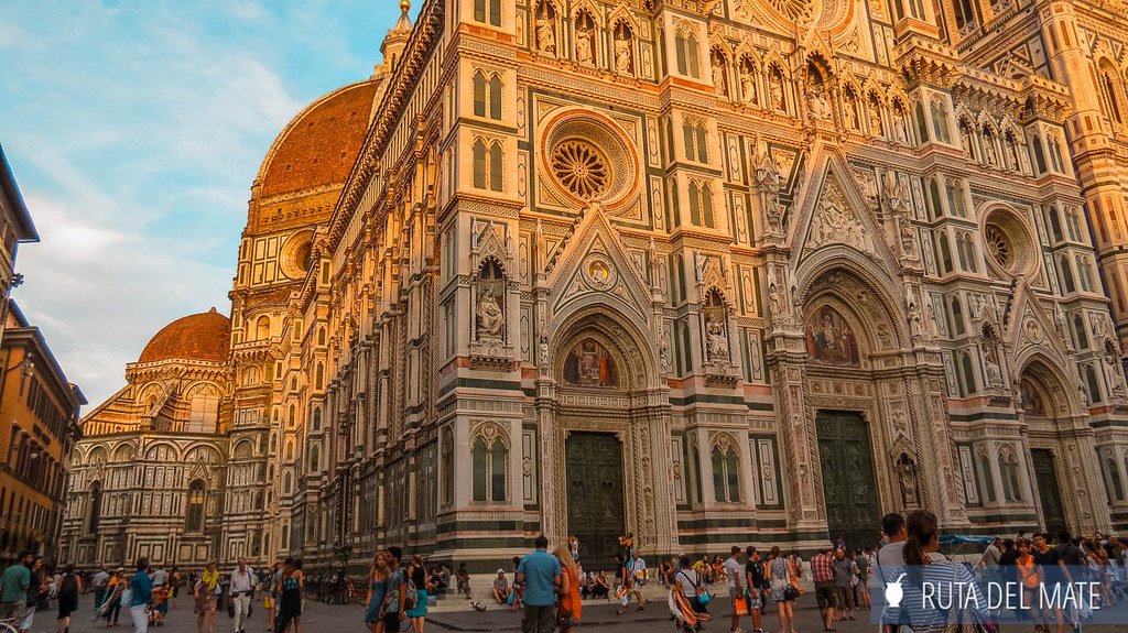 The last rays of the sun fall on the marble of the Basilica of Santa Maria del Fiore in Florence.