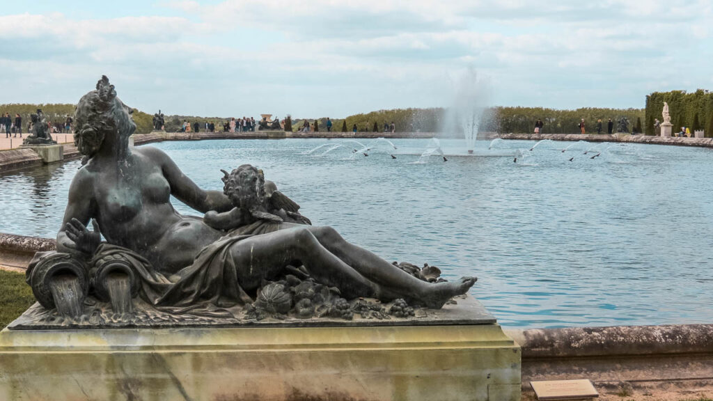 The Gardens of Versailles with fountains and sculptures