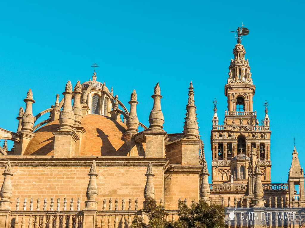 The dome of the Cathedral of Seville with the Giralda in the background.
