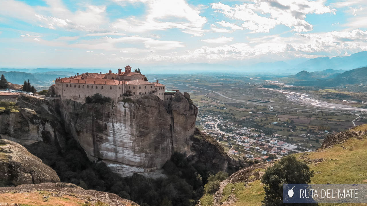 Panoramic view of the Monastery of Gran Meteoro and the valley bordering the mountain on the side.